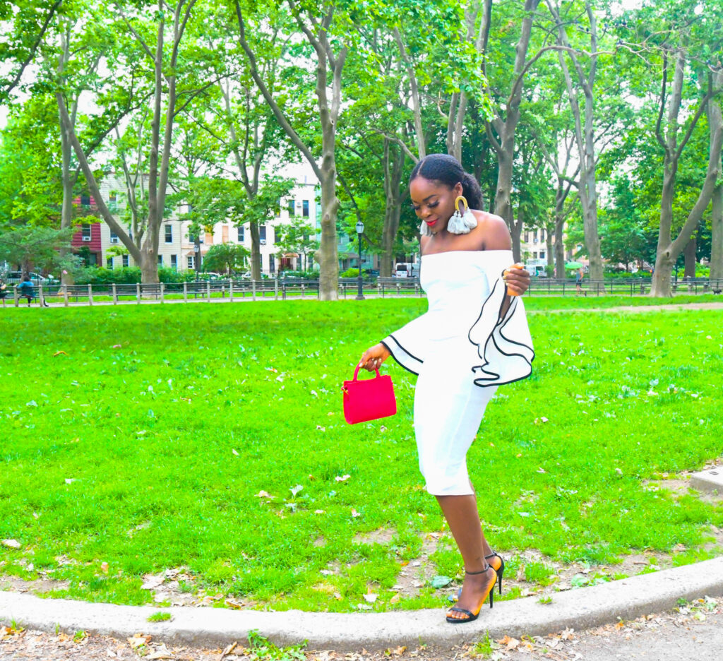 Befitting Style Oyinkan Wearing White Off Shoulder Dress - Dashing Earrings Red Brandon Blackwood ESR Bag